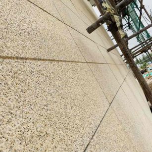 克拉玛依 黄金麻花岗岩荔枝面外墙干挂石材效果示例