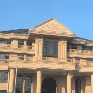 克拉玛依黄金麻别墅外墙干挂石材效果示例